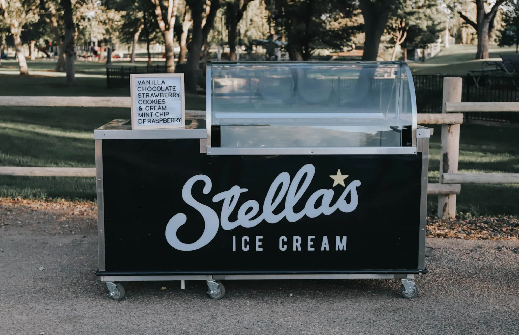 Stella's minimalist black wedding ice cream cart