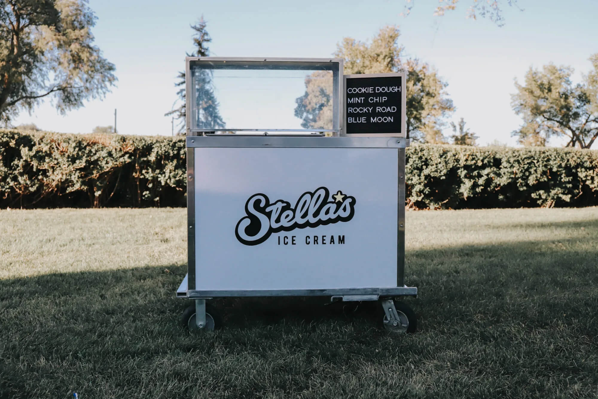Stella's white ice cream cart with pre-packaged cups